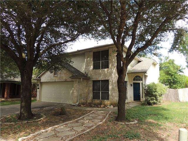 Tree shaded front lawn welcomes you home.