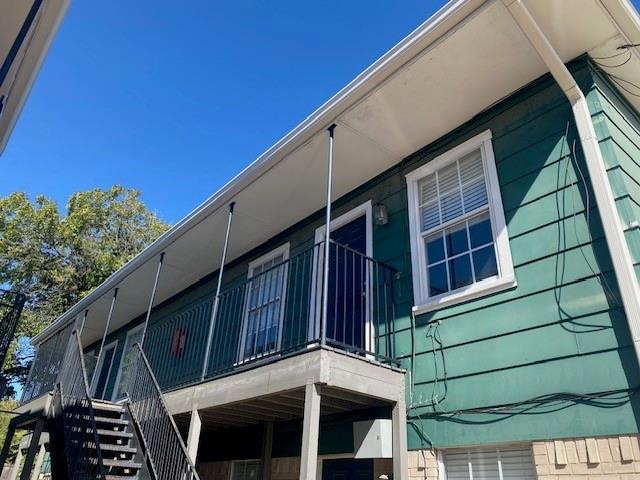 View of property exterior with a balcony