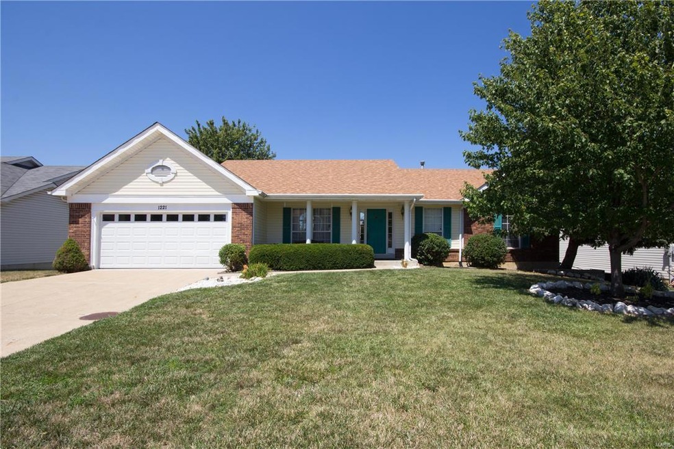 Brick veneer and covered front porch on this charm