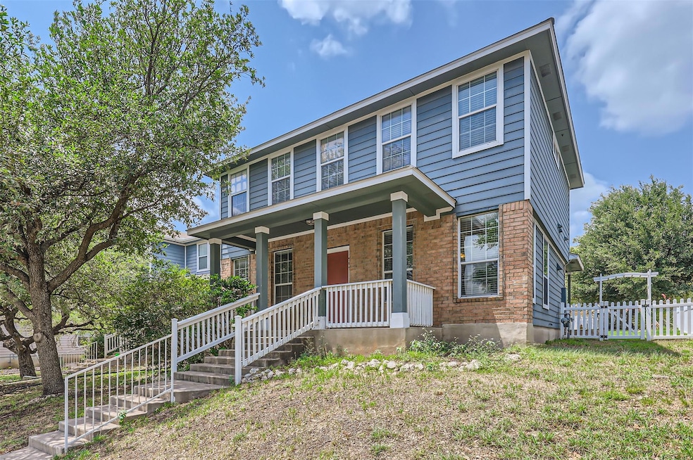 View of front of home featuring covered porch, br