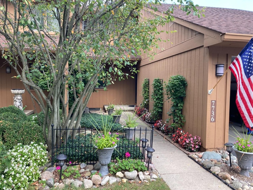 7736 Cottonwood Ln unit 34, Dexter, MI 48130 - photo 1