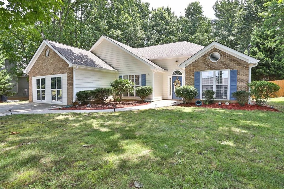 Mid-lawn, tons of driveway and across street parki