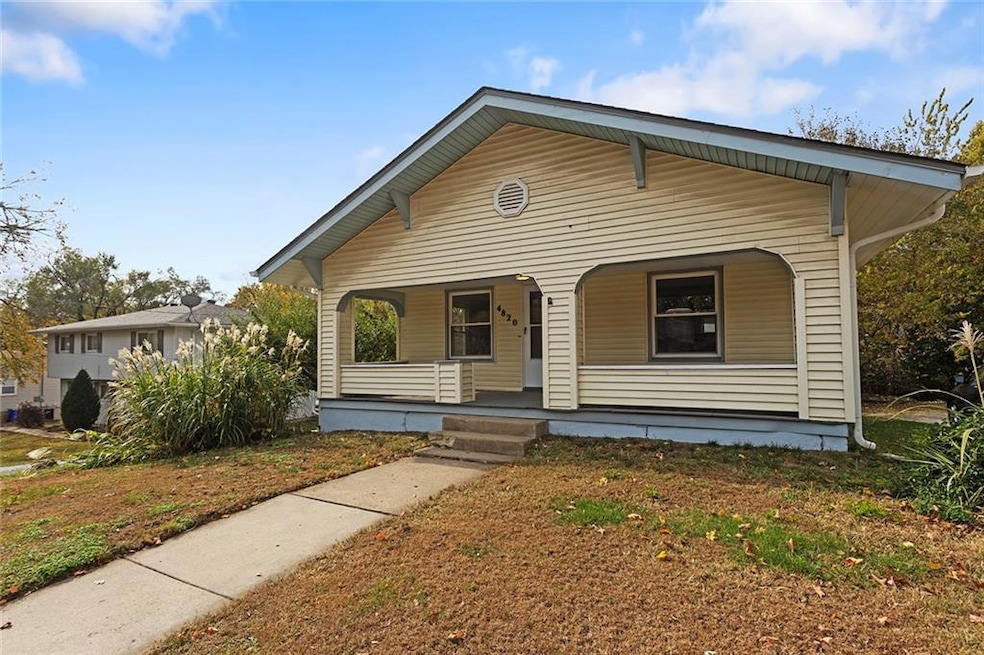 You will fall in love with this adorable bungalow - centrally located for quick highway access to the entire city