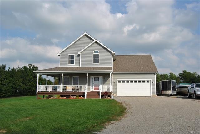 Front with large wrap around porch