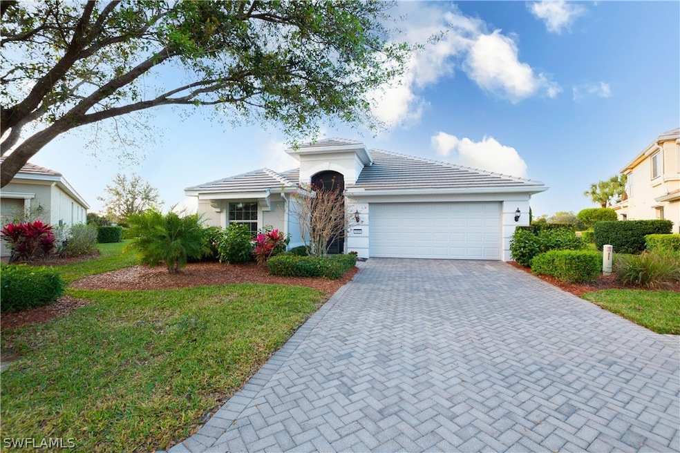 FRONT ELEVATION...Newer roof and gutters.