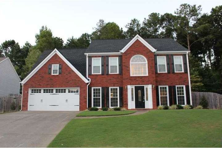 Exterior Front. New exterior paint & garage door