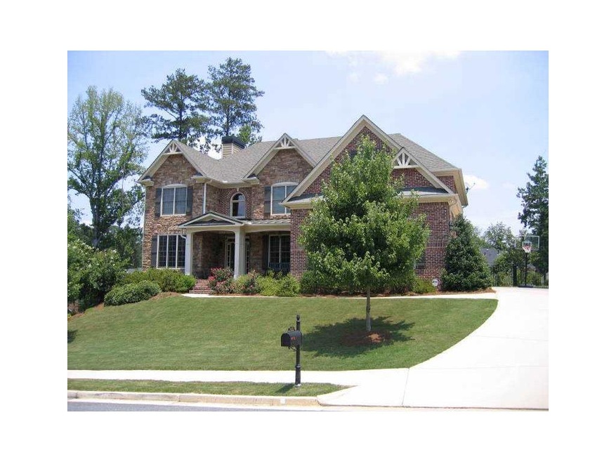 Exterior Front. Cul de Sac- 3 sided Brick - 3 car 