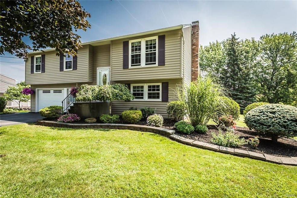 Welcome to 201 Juneway Drive! Gorgeously landscape