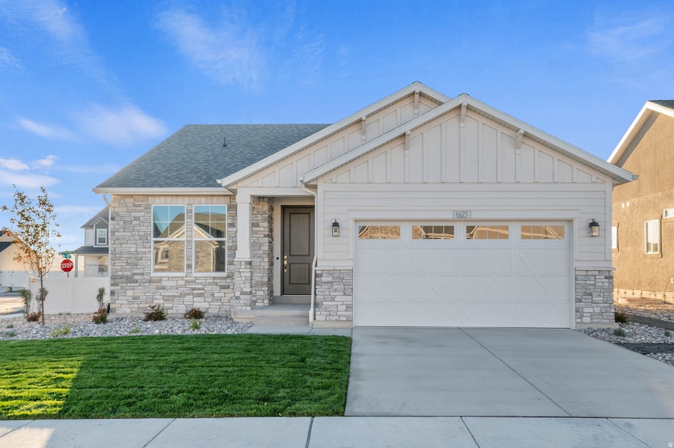 Craftsman-style home with board and batten siding, driveway, stone siding, an attached garage, and a shingled roof