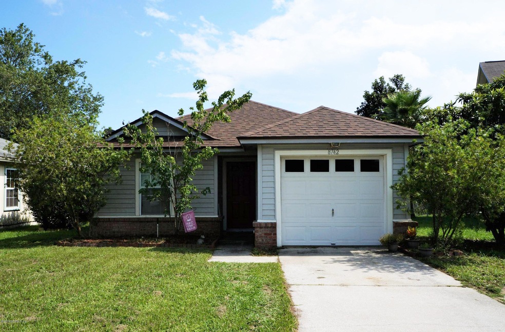 8742 Buzz Ct, Jacksonville, FL 32216 - photo 1