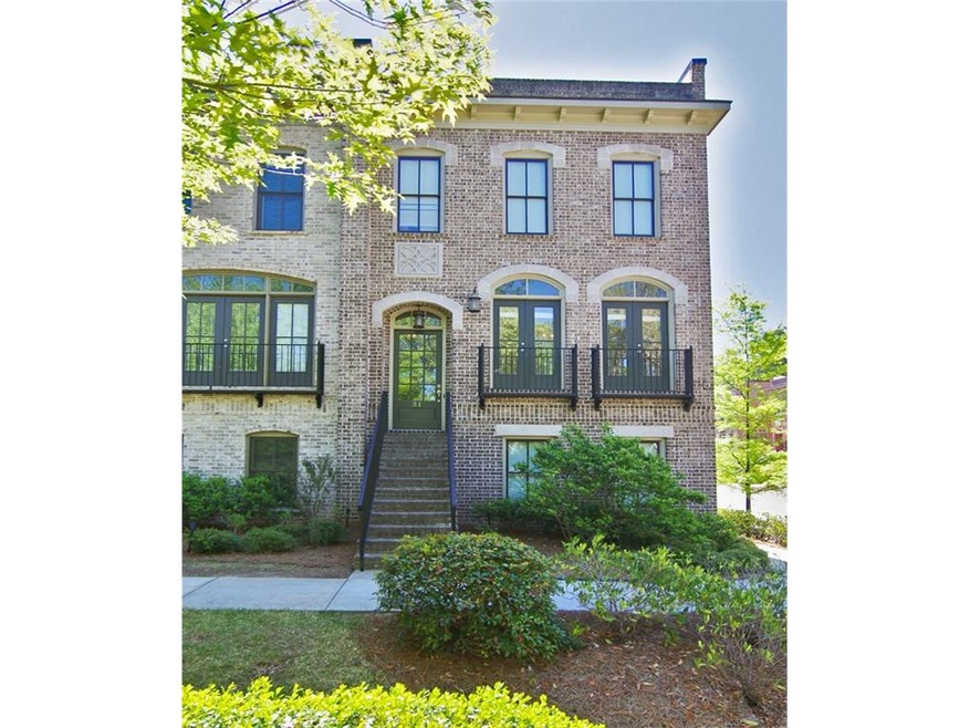 3 Story, 4 sided brick Monte Hewett end unit townh