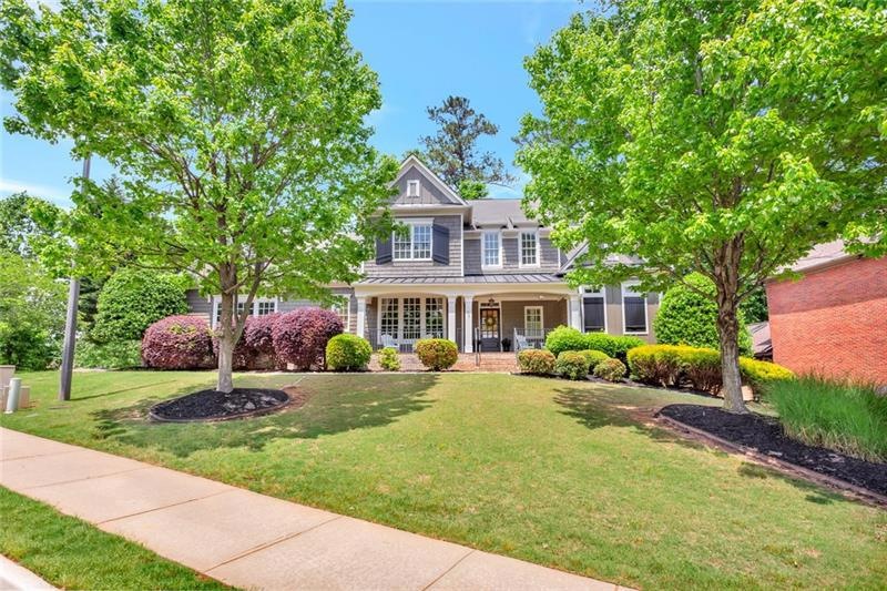 Expansive half-acre lot with lush landscaping
