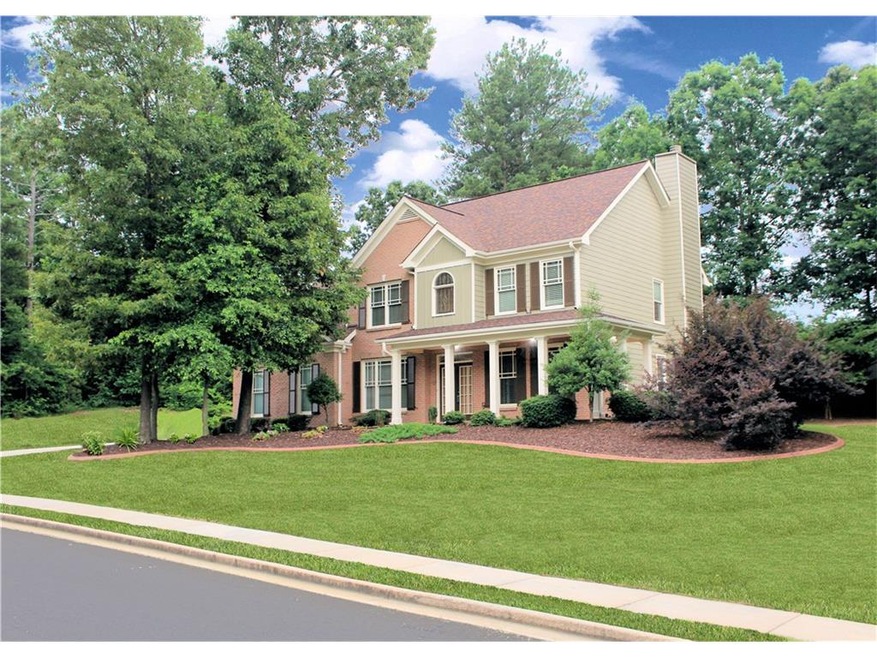 Professionally Landscaped Front and Back with Conc