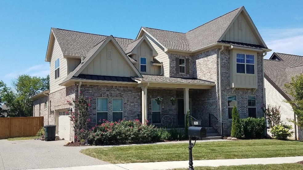 Only one year old!  Fantastic home with extensive hardwood, large, open kitchen.  Tons of trim!