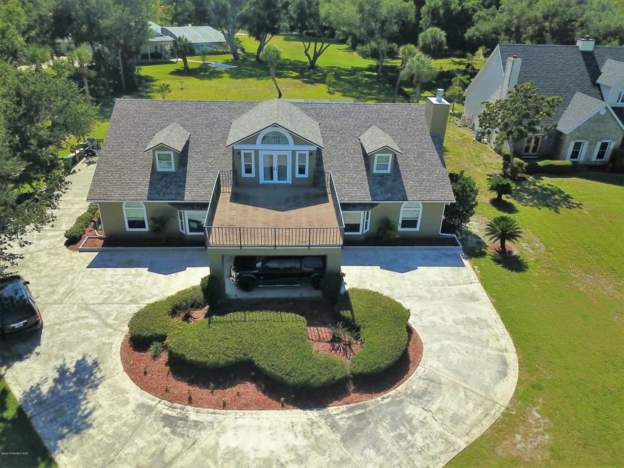 5685 S Tropical Trail, Merritt Island, FL 32952 - photo 1