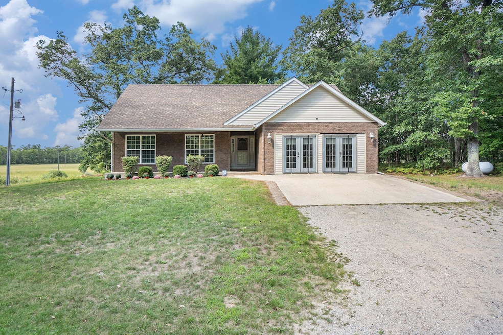 2715 W 13 Mile Rd, Bitely, MI 49309 - photo 1