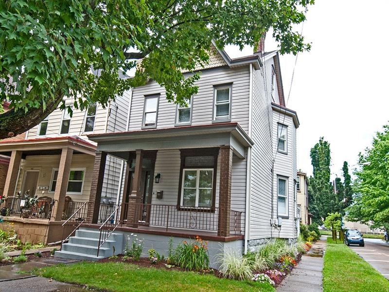 Sit and Relax on Your New Front Porch at 115 Weste