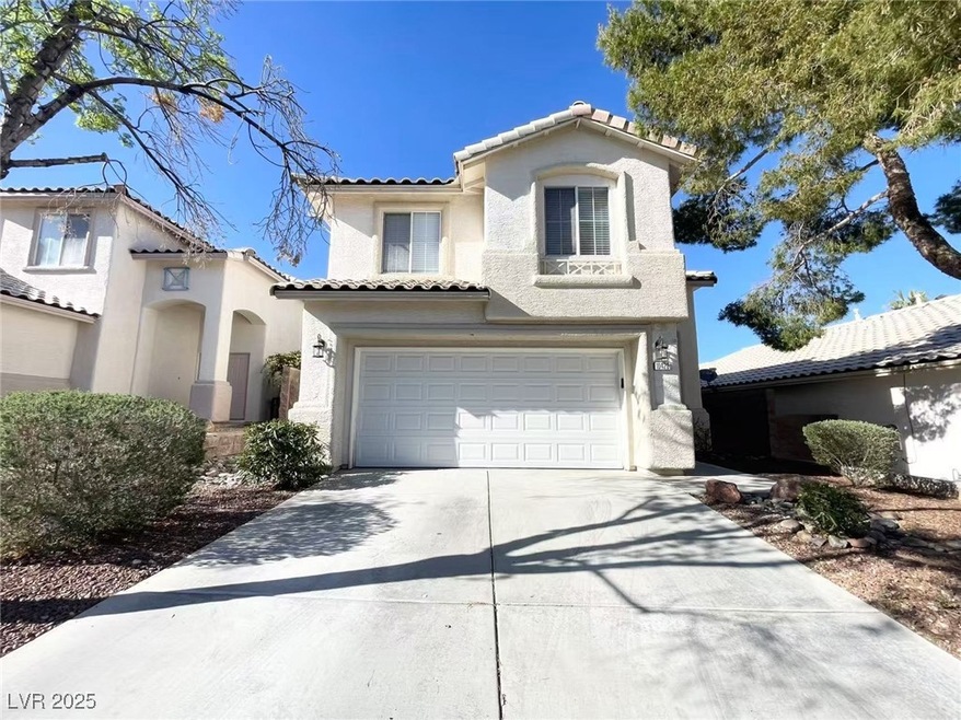 Mediterranean / spanish home featuring driveway, a