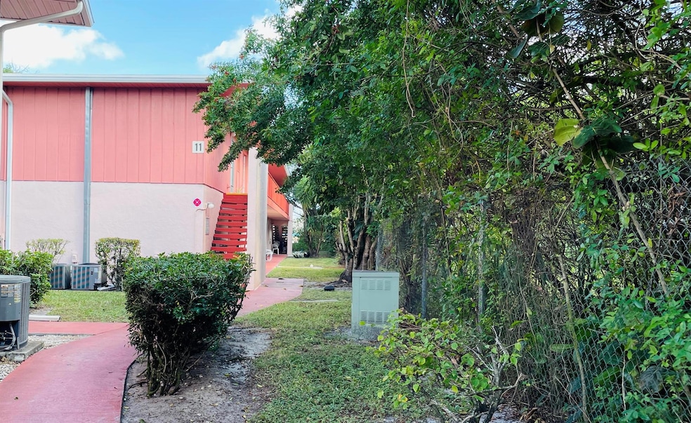 11 Golfs Edge unit E, West Palm Beach, FL 33417 - photo 1
