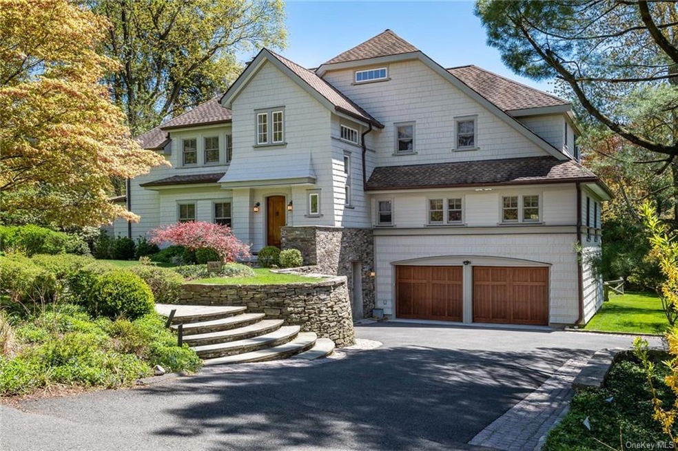 Timeless and stunning Shingle style home.