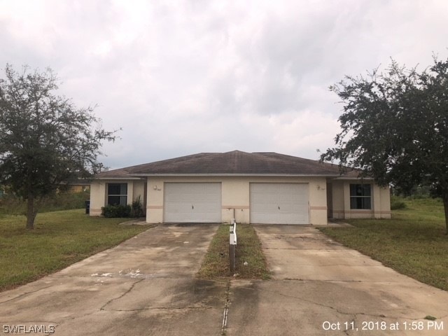 945 Chenault St, Lehigh Acres, FL 33974 - photo 1