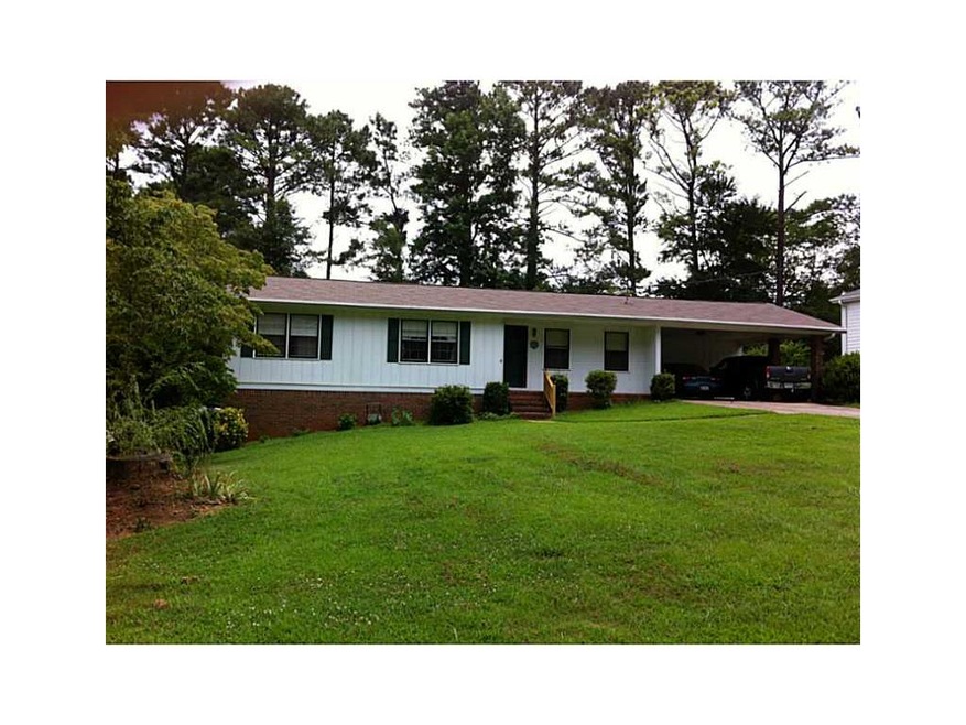 Exterior Front. Sparkling hardwood flooring highli