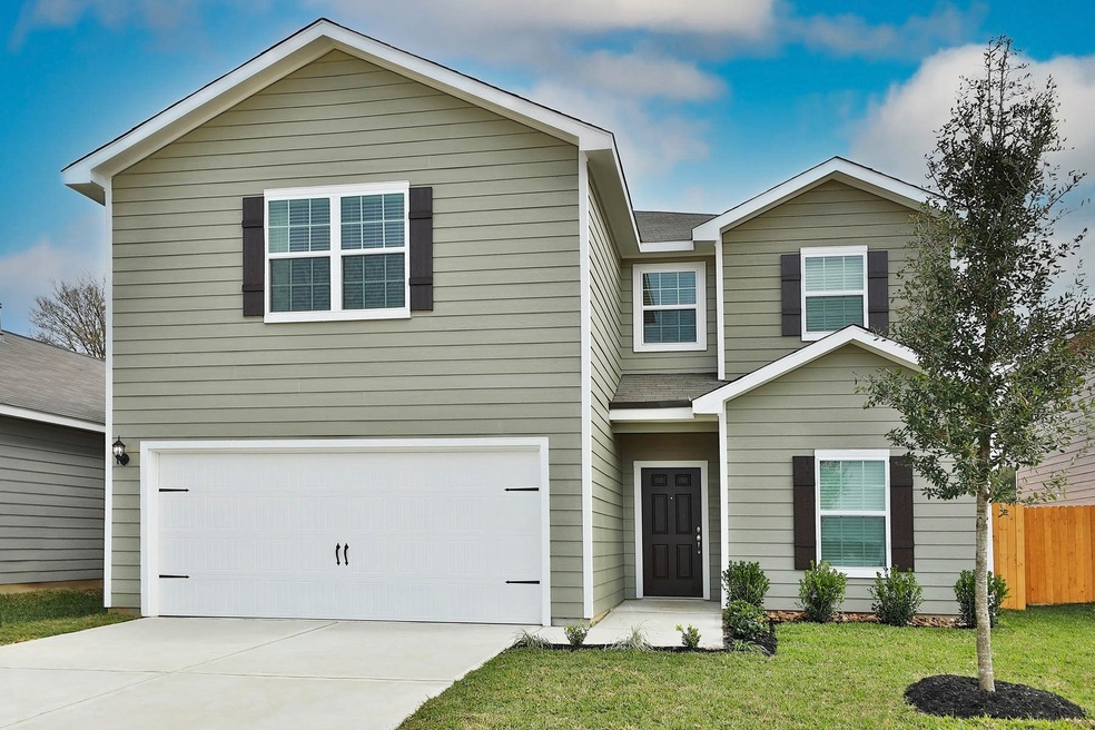 This dazzling Driftwood floor plan home is a spacious two story set to be built at 23025 Shakespeare drive in Magnolia by LGI Homes in Williams Trace.