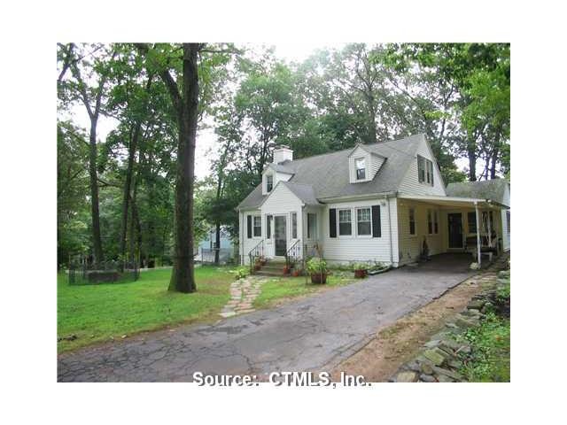 Exterior Front. Vinyl sided charming Cape