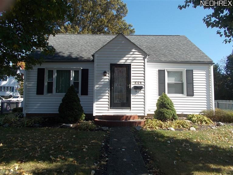 Cape cod with many fine features on a corner lot i
