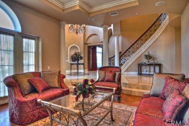 Lovely Living Room and Grand Staircase