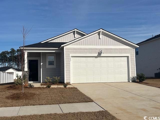 View of front of house featuring a garage
