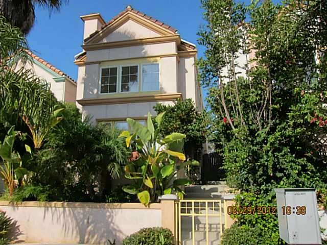 Great Curb Appeal with short walk to beach.