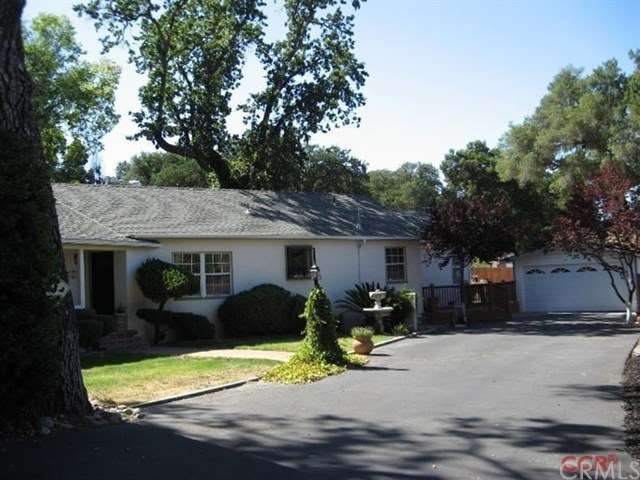 Private feel behind the gated entry with a classic