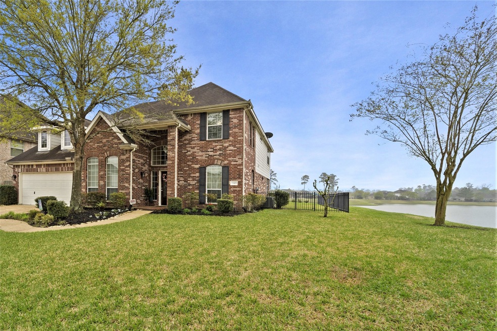 Welcome to 13411 Point Village Lane in Lakes at Northpointe. A spacious 2-story, lake view home located on a cul-de-sac.
