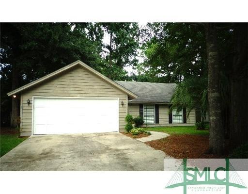 Exterior Front. Beautifully landscaped with lush P