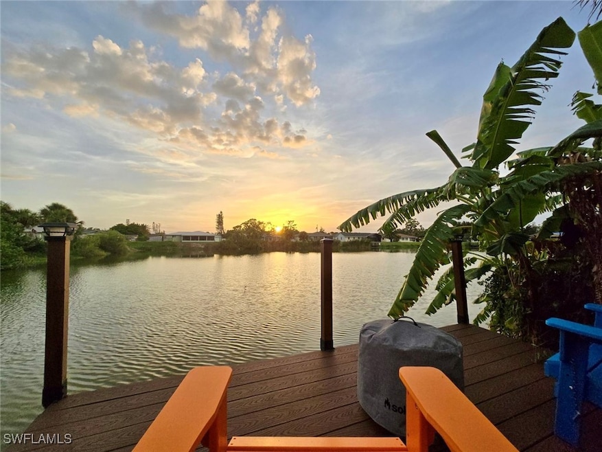 Dock area with a perfect sunset and water view
