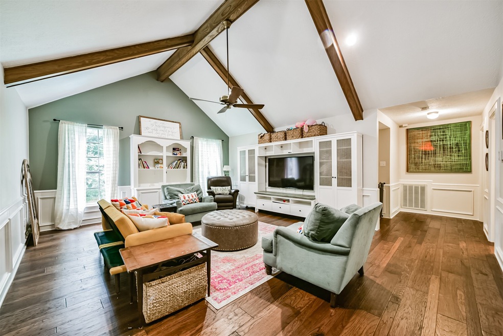 Game Room displays high ceilings and beams