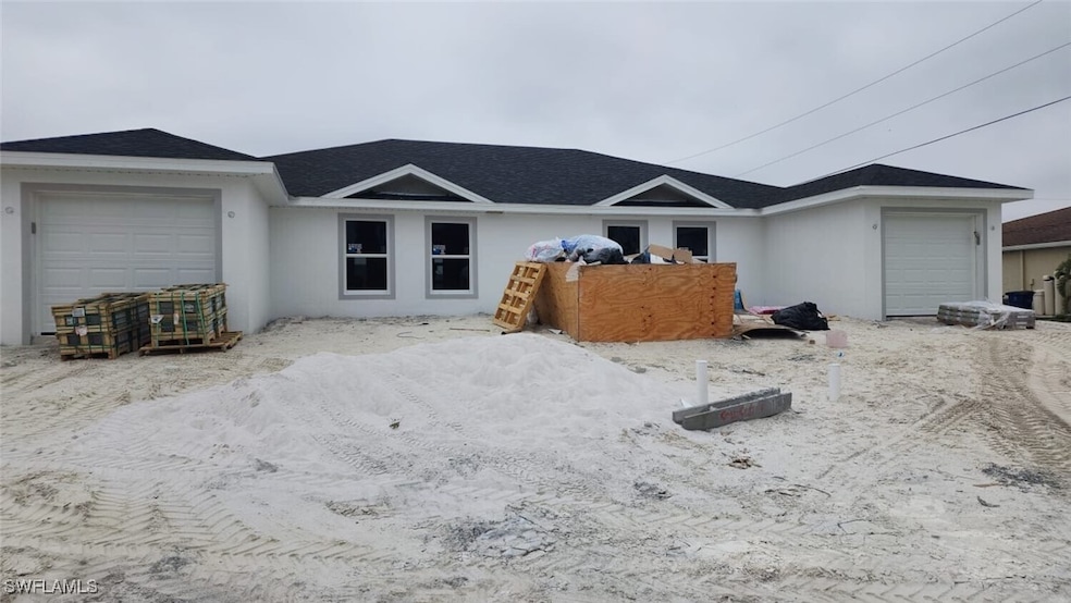 Single story home with a garage