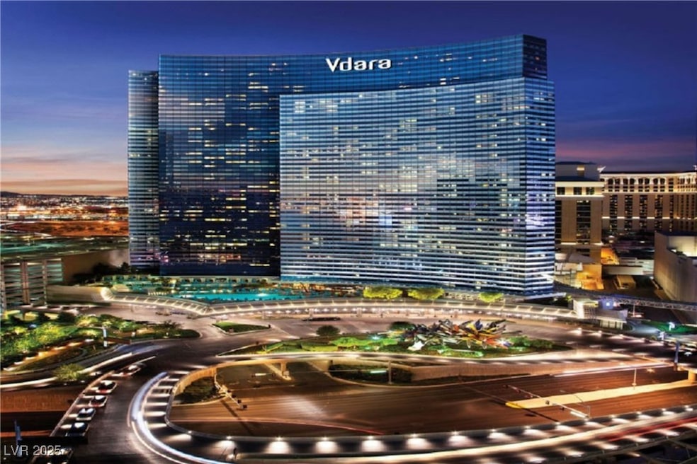 Property at dusk featuring a view of city