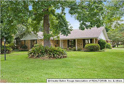 Front of home situated on beautiful corner lot
