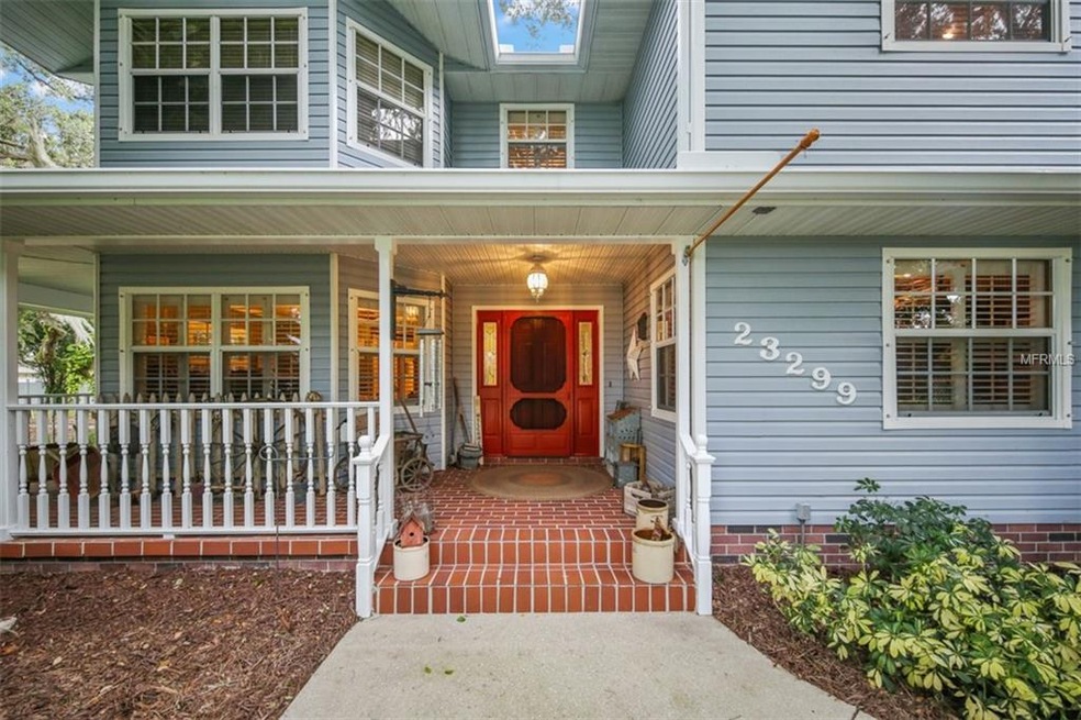 WELCOME HOME!!! Brick steps leading to this WRAP-A