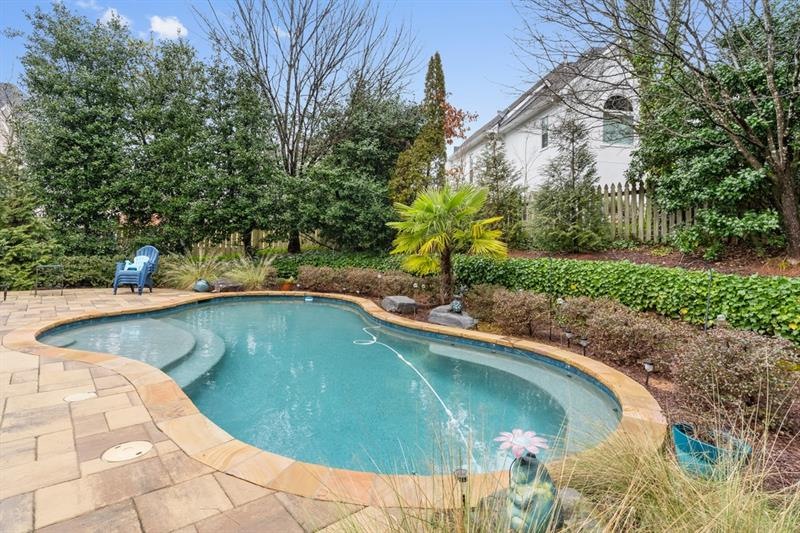 Almost new Pebble Tec heated pool with built in seating, sun pad! A private oasis!