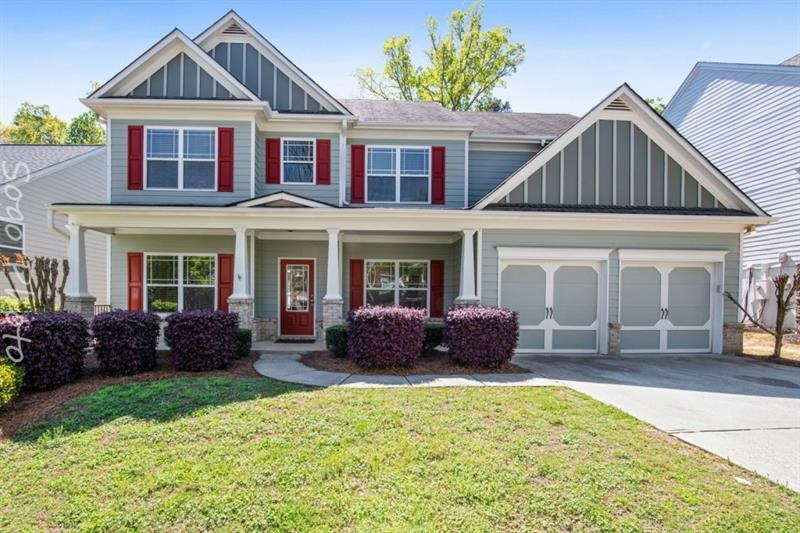 CURB APPEAL!  WELCOME HOME!! 3 CAR TANDEM GARAGE!