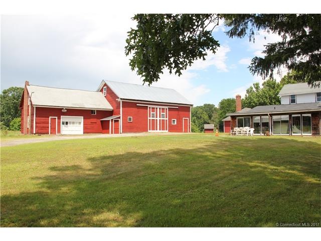 Freshly painted barn and side of main house