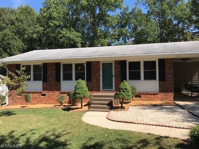 Front view with 20' deep carport!