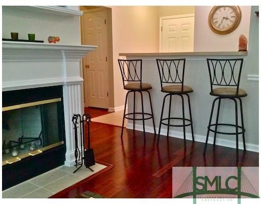 Living Room. Beautiful floors, fireplace, breakfas