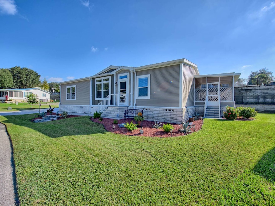 729 Bishop Dr, Lady Lake, FL 32159 - photo 1