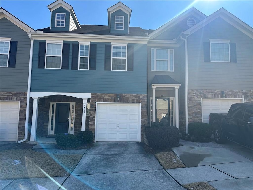 Multi unit property featuring a garage