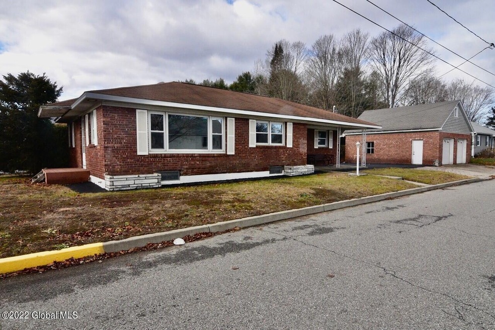 310 W Maple St, Corinth, NY 12822 - photo 1