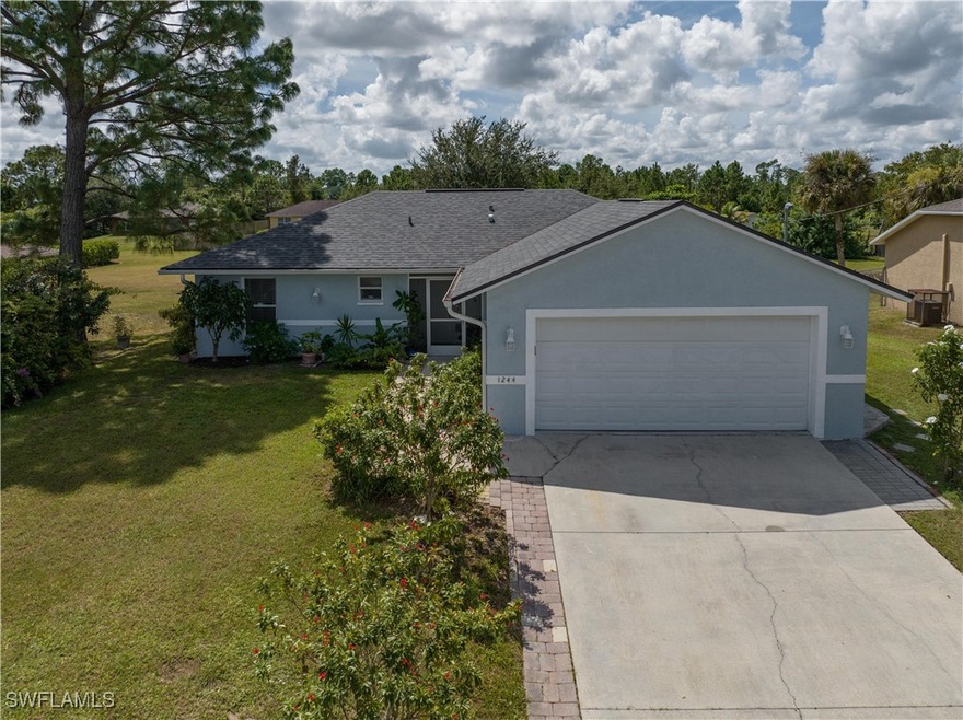 1244 Ermine St E, Lehigh Acres, FL 33974 - photo 1